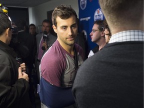 Jordan Eberle speaks with the media with his right arm in a sling as the players practice. Eberle will be out of the lineup for four to six weeks with a shoulder injury. The Oilers are practising on Wednesday at the Royal Glenora Rink.