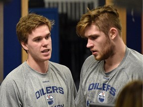 Connor McDavid, left, chats with Leon Draisaitl during fitness testing at Rexall Place in Edmonton on July 1, 2015.