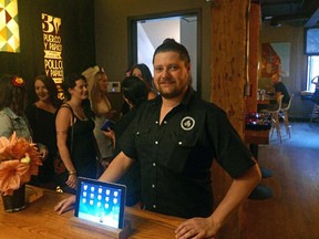 Nic Martin, General Manager, Rostizado Restaurant. This is for a story about a new app for restaurants that don't take reservations. It's called No Wait and it monitors the length of the line and the wait time at such restaurants. Rostizado has it.