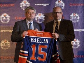 EDMONTON, ALBERTA ; MAY 19, 2015--Edmonton Oilers President and General Manager Peter Chiarelli (right)  announces Oilers new head coach Todd McLellan (left) on May 19, 2015, in Edmonton. (Greg Southam/Edmonton Journal)