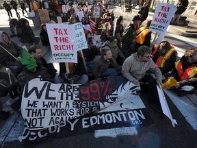Occupy Edmonton protesters, bemoaning their place in the financial stratosphere, staged a sit-in along Jasper Avenue in 2011.