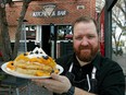 Andrew Cowan, head chef at Packrat Louie, with pancakes with peaches and buttermilk whipped cream