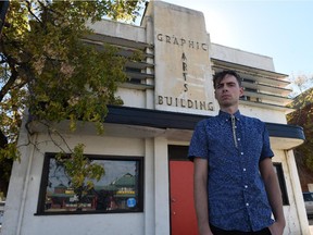 Will Zimmerman stands in front of the Graphic Arts Building in Edmonton in September. He and other musicians and artists want to convince the city to save the building and another one next door which are slated for demolition as part of work involving the Valley LRT line.