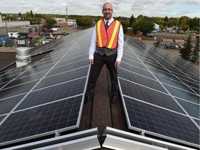 Clifton Lofthaug, Owner of Great Canadian Solar Ltd., with the new solar panels on the roof of the Devon Community Centre in Devon on Wednesday Sept. 9, 2015.
