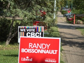 Federal election signs dot lawns in the Edmonton Centre riding.