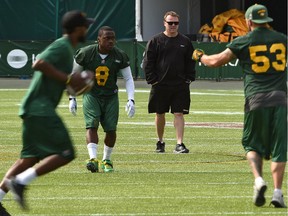 Eskimos head coach Chris Jones watches the defence during a walk through practice in August at Commonwealth Stadium.