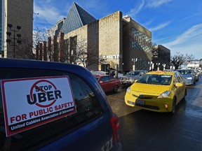 About 150 taxi drivers held a protest at City Hall over concerns about unfair competition from Uber drivers in Edmonton, January 2015.
