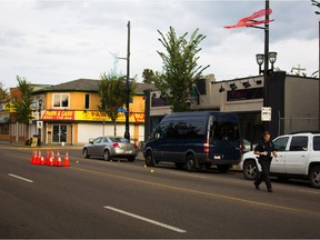 EDMONTON, Alta: Sept. 7, 2015 - Police close 118 Ave between 88 and 89 St after two men were shot and taken to hospital with non-life threatening injuries. Photo by Topher Seguin