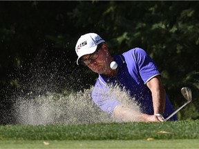 Mike Belbin blasting out the bunker in the final round, wins the PGA of Alberta Tour Championship at the Royal Mayfair Golf Club in Edmonton, September 1, 2015.