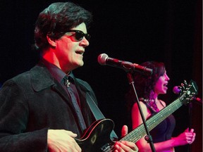 Roman Pfob as Roy Orbison, and Devra Straker in a scene from Dark Star: The Life and Times of Roy Orbison at the Mayfield Dinner Theatre in Edmonton.