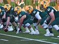 University of Alberta Golden Bears offensive line gets set for a play against the University of Saskatchewan Huskies at Foote Field in Edmonton,  on Sept. 11, 2015.