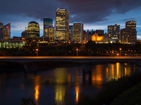 The Edmonton skyline at night from the south side with a beautiful reflection of the lights in the North Saskatchewan river in Edmonton on Sept. 14, 2015.
