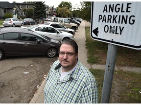 Standing on 81st Avenue, Kim Clegg, planning development committee co-chair for Queen Alexandra community, is concerned about the city looking at reducing parking requirements for bars and restaurants in commercial areas such as Old Strathcona.