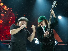Singer Brian Johnson and guitarist Angus Young of AC/DC perform at Commonwealth Stadium in Edmonton, Sept. 20, 2015.