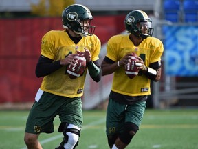 Eskimos quarterbacks Mike Reilly, left, and James Franklin practise at Clarke Field on Sept. 23, 2015.