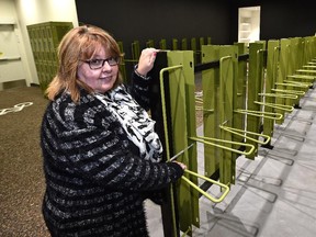 EDMONTON, ALTA: SEPTEMBER 4, 2015 -- Oxford Properties manager Debra Edwards shows off the Edmonton City Centre mall's new bike storage facility for employees.