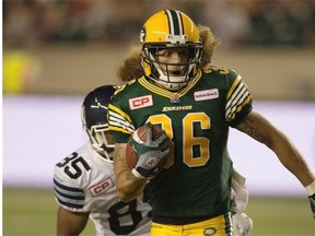 Edmonton Eskimos defensive back Aaron Grymes has a long runback after intercepting a Toronto Argonauts pass during Friday’s Canadian Football League game at Commonwealth Stadium.