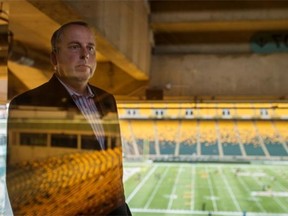 Edmonton Eskimos President and CEO Len Rhodes poses for a photo at Commonwealth Stadium in Edmonton on August 26, 2015. Rhodes has spoken publicly for the first time about the abuse that he witnessed in his home as a child and the impact it’s had on him through his life.