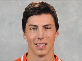 EDMONTON, CANADA - SEPTEMBER 18: Ryan Nugent-Hopkins #93 of the Edmonton Oilers poses for his official headshot for the 2014-2015 season on September 18, 2014 at the Rexall Place in Edmonton, Alberta, Canada.