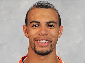 EDMONTON, CANADA - SEPTEMBER 11: Darnell Nurse #74 of the Edmonton Oilers poses for his official headshot for the 2014-2015 season on September 11, 2014 at the Rexall Place in Edmonton, Alberta, Canada.
