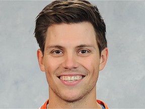 EDMONTON, CANADA - SEPTEMBER 11: Dillon Simpson  of the Edmonton Oilers poses for his official headshot for the 2014-2015 season on September 11, 2014 at the Rexall Place in Edmonton, Alberta, Canada.