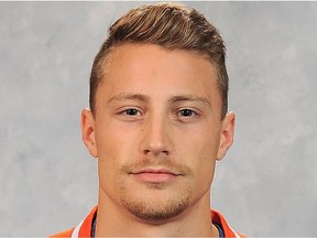 EDMONTON, CANADA - SEPTEMBER 11: Laurent Brossoit #1 of the Edmonton Oilers poses for his official headshot for the 2014-2015 season on September 11, 2014 at the Rexall Place in Edmonton, Alberta, Canada.