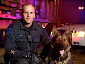 Edmonton Police service animal Maverick, who won top police dog honours, is seen here with his handler, Const. Murray Burke, in a photo from 2011.