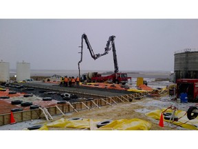 This Jan. 27, 2012 file photo shows concrete being poured for the second phase of the Growing Power Hairy Hill integrated bio-refinery in Hairy Hill, east of Edmonton.