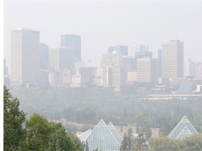 A hazy view of the Edmonton skyline caused by smoke from wildfires in Alberta on July 11, 2015. Edmonton’s air quality is expected to deteriorate, prompting Alberta Health Services to issue an air quality advisory on Aug. 26. Air quality in the city is currently considered low risk, but it’s forecasted to rise to six, or a moderate level, according to the AHS scale.