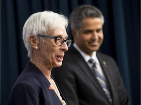 Jan Reimer, executive director, Alberta Council of Women's Shelters, and Human Services Minister Irfan Sabir announce $15 million in new funding for support of women's shelters on Sept. 23, 2015, in Edmonton.