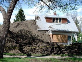 Infill construction issues - In May 2014, a contractor excavating for a semi-detached infill project in McKernan nearly engulfed the adjacent vacant house to store dirt.