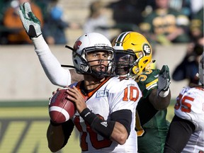 B.C. Lions quarterback Jonathon Jennings (10) is sacked by Edmonton Eskimos' Willie Jefferson (99) during second half CFL action at Commonwealth Place on Saturday, Sept. 26, 2015.