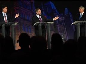 Liberal Leader Justin Trudeau, left, NDP Leader Tom Mulcair and Conservative Leader Stephen Harper, right, take part in the leaders' debate Thursday, Sept. 17, 2015  in Calgary.