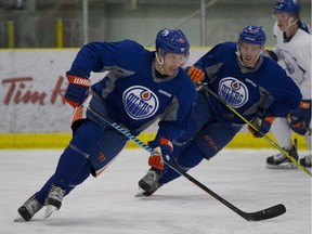 Taylor Hall and Connor McDavid skate laps at the Edmonton Oilers open training camp in Leduc on Sept. 18, 2015.