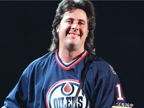 Country star Vince Gill shows off his blue-and-orange sweater during a 1997 concert at what was then Northlands Coliseum.