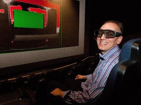 Mike Steger, VP marketing and communications with the Telus World of Science, in the IMAX theatre  in December 2013. A new projection system will be installed this month.