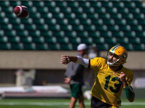 Mike Reilly of the Edmonton Eskimos warms up during practice at commonwealth stadium on Sept. 3, 2015.