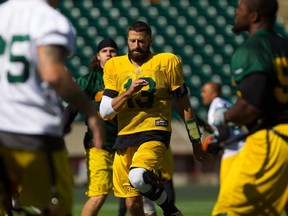 Edmonton Eskimos quarterback Mike Reilly warms up during a practice at Commonwealth Stadium on Sept. 3, 2015.