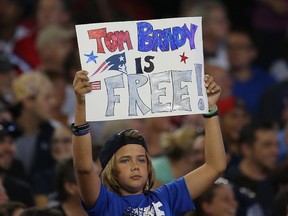 A fan shows support Tom Brady of the New England Patriots during a pre-season game with the New York Giants at Gillette Stadium on September 3, 2015 in Foxboro, Massachusetts.