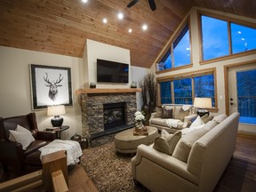 Elements of the traditional mountain home at Creekstone include rock fireplaces with fir timber mantles.