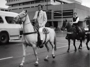 Municipal candidate Lance White donned an almost-white suit, mounted an almost-white steed and led a mini-parade through downtown Edmonton in 1963.