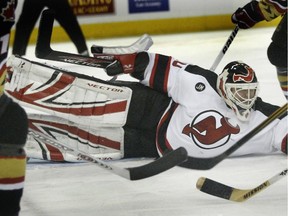 New Jersey goalie Martin Brodeur finds the puck amid all the traffic.