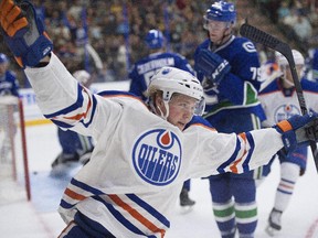 Braden Christoffer of the Edmonton Oilers scores against the Vancouver Canucks at the South Okanagan Events Centre in Penticton, B.C. The Oilers defeated Vancouver 8-2 in the Sept. 11, 2015, game.