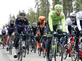 Racers, led by Canadian Ryder Hesjedal (in green) take off from the start line of the second stage of the 2015 Tour of Alberta on Thursday September 3, 2015. Several downtown Edmonton roads will be closed as cyclists make their way to the finish line in Churchill Square in Edmonton on  Monday September 7.