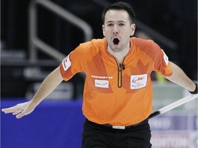 Skip John Epping calls to his sweepers in draw 6 against Jeff Stoughton at the 2013 Roar Of The Rings championship in Winnipeg, Tuesday, December 3, 2013.