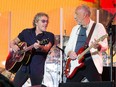 Roger Daltrey and Pete Townshend of The Who at the Glastonbury music festival. The band has been forced to postpone its 50th-anniversary tour in the wake of Daltrey's viral meningitis diagnosis.