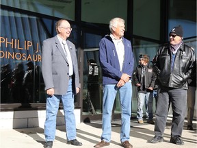 Ross Sutherland, left, chairman of the River of Death and Discovery Dinosaur Museum Society, Philip Currie, a University of Alberta paleontologist, Dan Aykroyd attend the unveiling of the cornerstone at the Philip J. Currie Dinosaur Museum on Saturday Sept. 26, 2015 in Wembley.