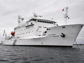 The Russian ship, Akademik Sergey Vavilov, a cruise ship run by One Ocean Expeditions anchored offshore from Cambridge Bay, Nunavut, Aug. 23, 2015. On board speaking to the tourists, Charles Dagneau, Parks Canada underwater archaeologist, was part of the team that found the HMS Erebus, Franklins ship used for his expedition in 1845, discovered last year in the Victoria Strait.