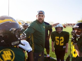 Ryan King of the Edmonton Eskimos organizes his group during the 2015 Eskimos Amateur Football Camp at Clarke Stadium, on May 11, 2015.