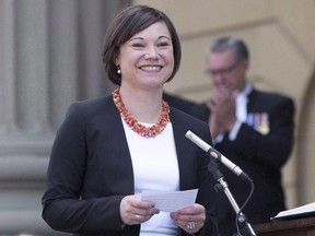 Shannon Phillips is sworn in as the Alberta Minister of Environment and Parks and Minister Responsible of the Status of Women in Edmonton on May 24, 2015.